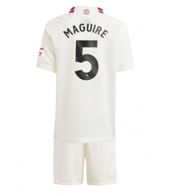 Manchester United Harry Maguire #5 Koszulka Trzecich Dziecięca 2023-24 Krótki Rękaw (+ Krótkie spodenki)